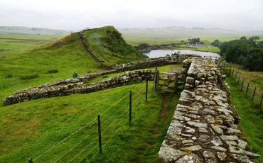 Hadrian's Wall is a stone wall and/or turf and timber fortification built by the Romans across Britannia (what is now Northern England ... along the border between England and Scotland).  Construction was begun in 122 A.D., yet physical remains of the fortification and early customs post remain to this day.  A UNESCO World Heritage Site ... it is considered the most important Roman monument extant in Great Britain.  Photo by Eva Schuster of Dresden, Germany. 